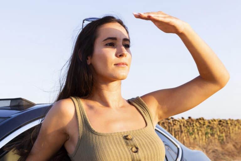 woman-looking-sun-while-enjoying-nature-san-diego